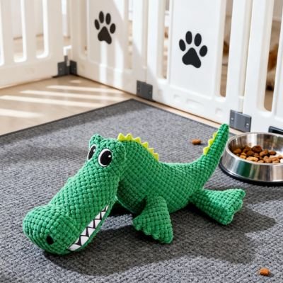 Peluche pour chien au sol